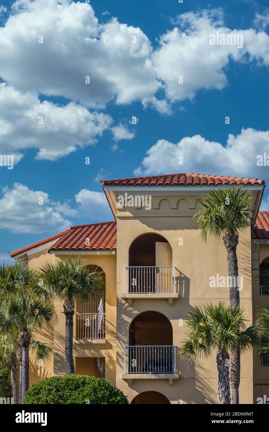 Arches in Stucco Hotel with Palm Trees Stock Photo - Alamy