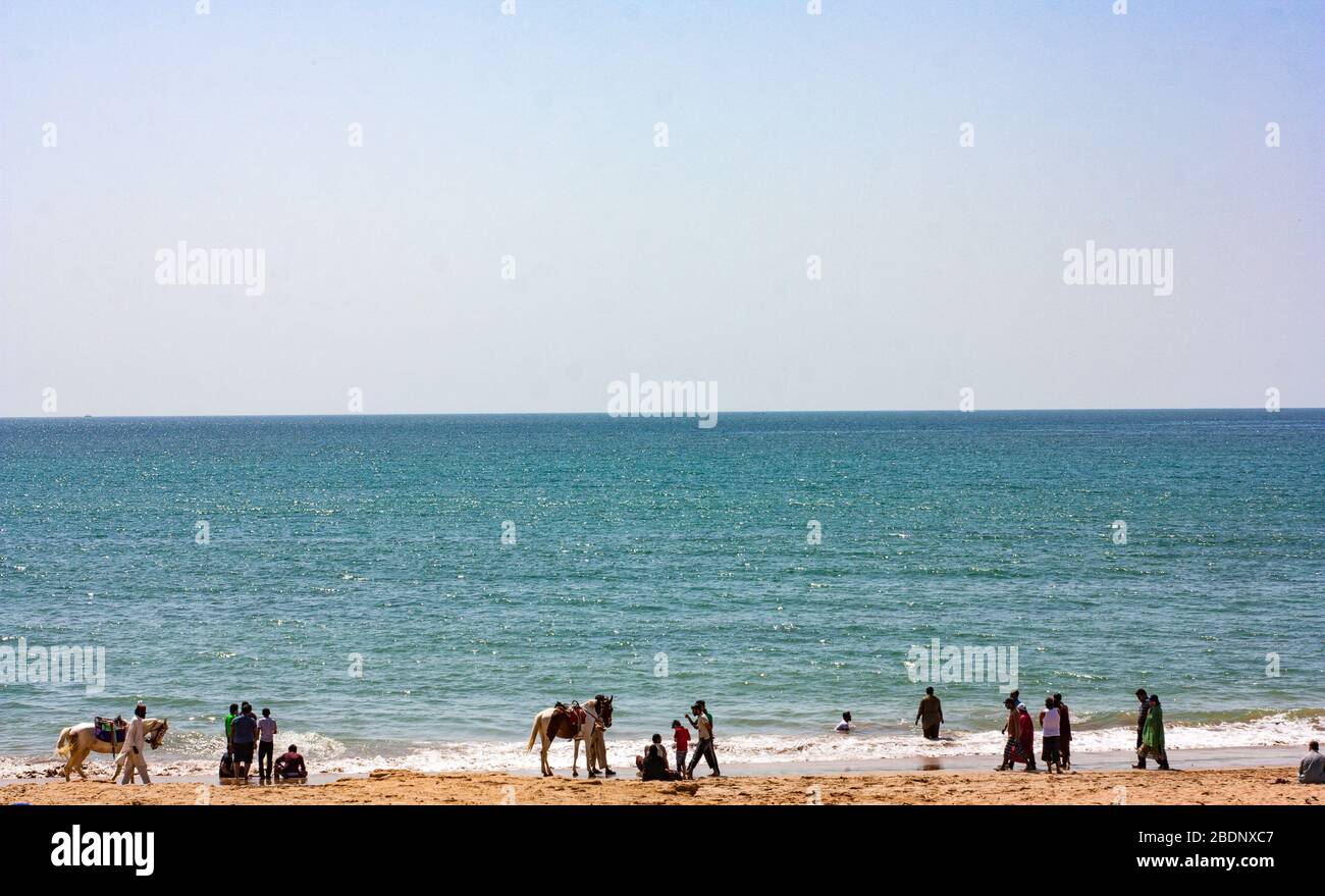 Tushan Beach, Keamari, Karachi, City, Sindh, Pakistan, On 24-02-2019 People Are Enjoying At The Beach & Horse Ride Searching For Their Customers Stock Photo