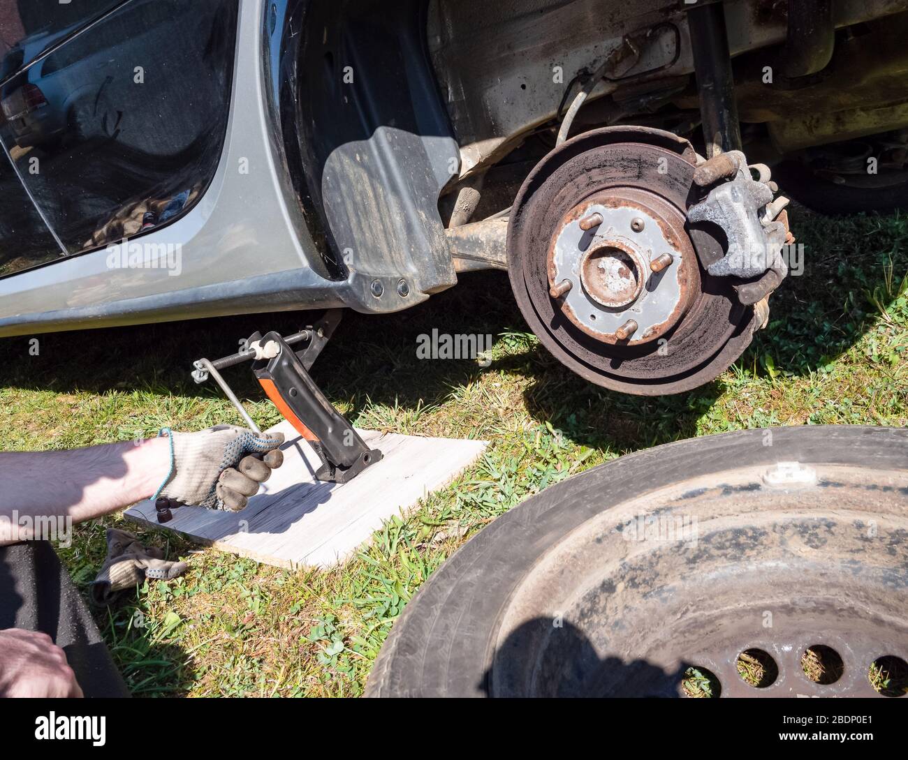 defective disc brake when changing tires Stock Photo Alamy