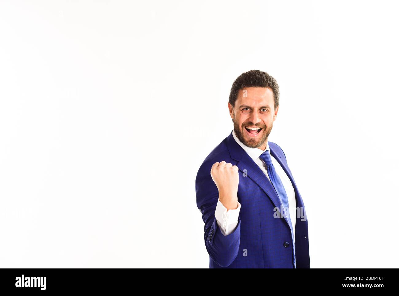 Businessman shows gesture of success with raised fist. Business and ...