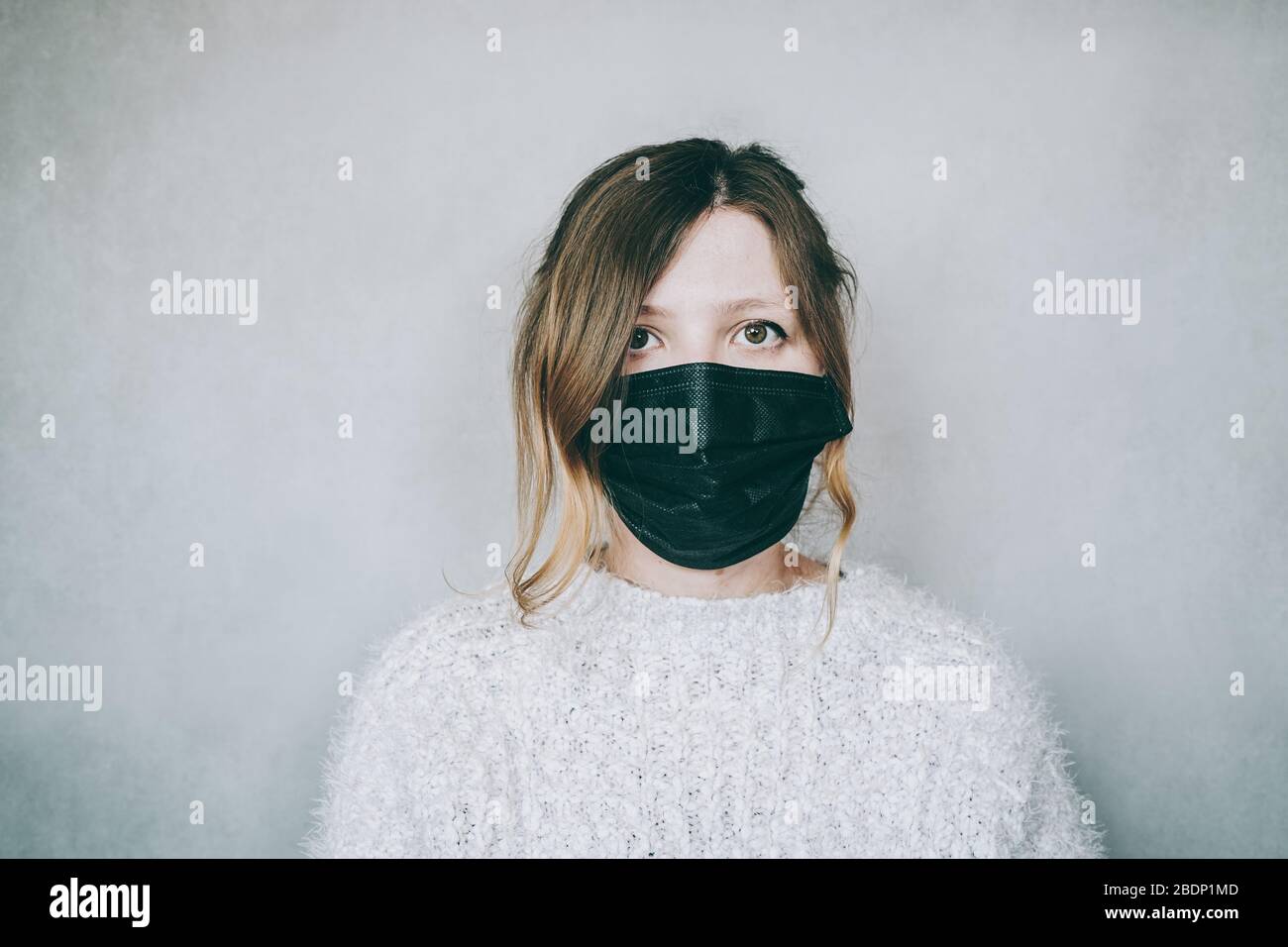 Woman in black face mask hi-res stock photography and images - Alamy