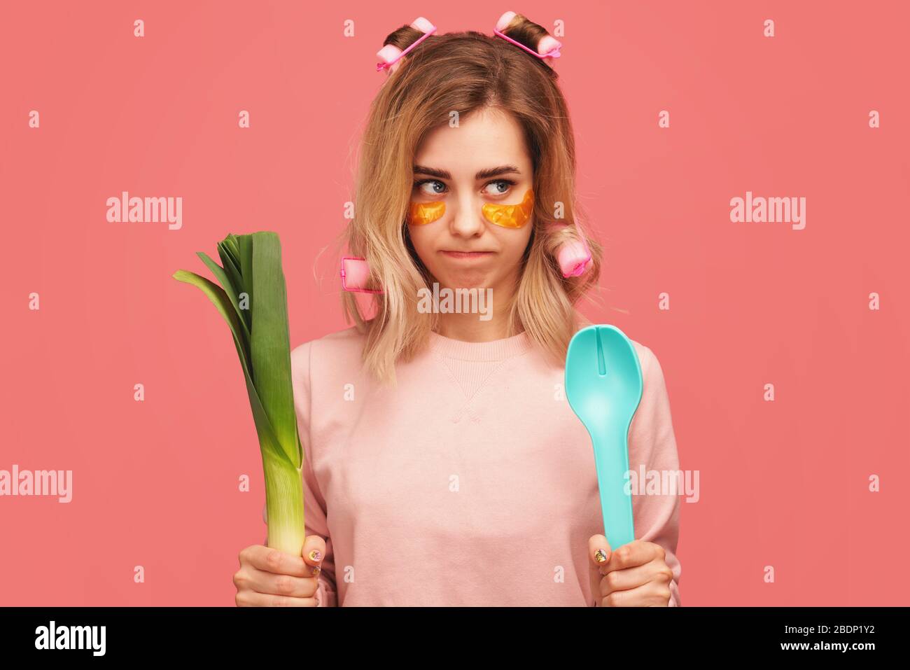 girl purses lips, looks sideways, makes mistake Stock Photo Alamy