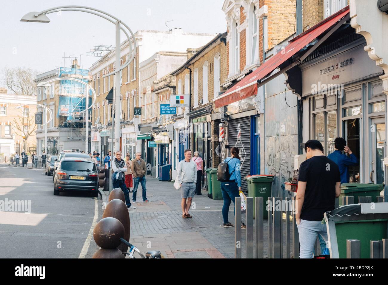 Bellenden Road, Peckam, London, UK. 9th Apr, 2020. Shoppers queue