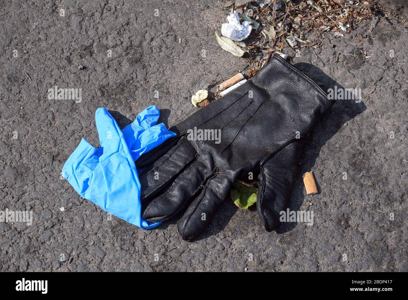 Birmingham, West Midlands, UK. 9th Apr, 2020. Although coronavirus is an invisible threat to the human eye, a more visible blight on the country are discarded gloves and face masks. Pictures show used gloves and masks, which may be contaminated, strewn on the floor in Birmingham's city centre. Credit: Sam Holiday/Alamy Live News Stock Photo