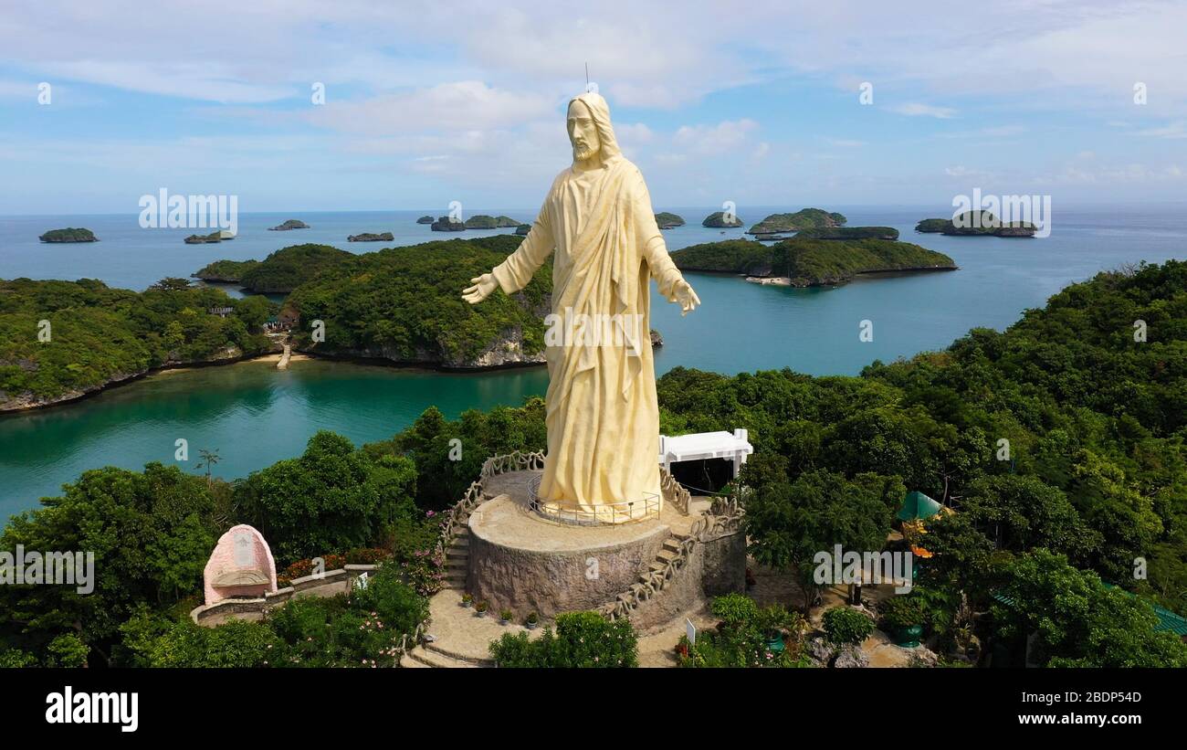 Statue of Jesus Christ on Pilgrimage island in Hundred Islands National ...