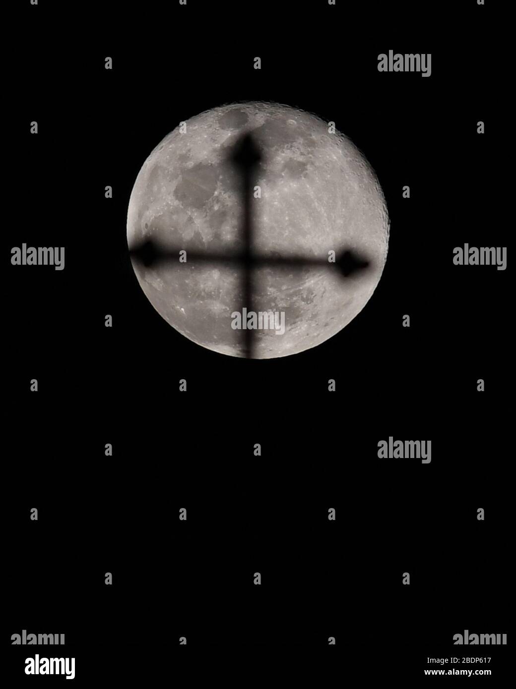 DEERFIELD BEACH, FL APRIL 08 Pink full moon seen over Saint Ambrose