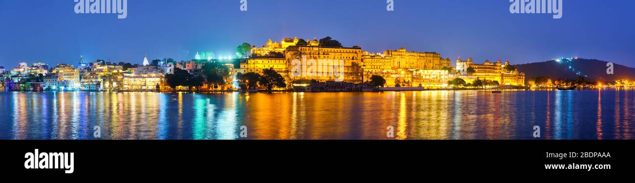 Udaipur City Palace in the evening panorama. Udaipur, India Stock Photo