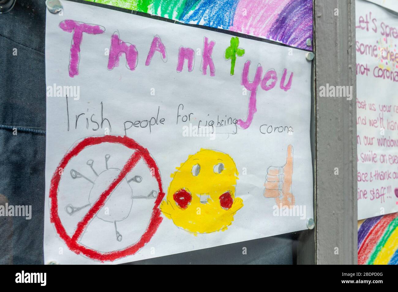 Timoleague, West Cork, Ireland. 9th Apr, 2020. Local children in Timoleague have created drawings thanking frontline staff for their efforts in the fight against Covid-19. The pictures are in the window of local Timoleague restaurant, Dillon's. Credit: Andy Gibson/Alamy Live News Stock Photo