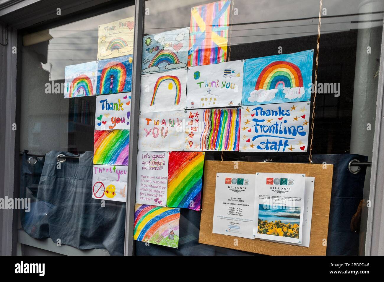 Timoleague, West Cork, Ireland. 9th Apr, 2020. Local children in Timoleague have created drawings thanking frontline staff for their efforts in the fight against Covid-19. The pictures are in the window of local Timoleague restaurant, Dillon's. Credit: Andy Gibson/Alamy Live News Stock Photo