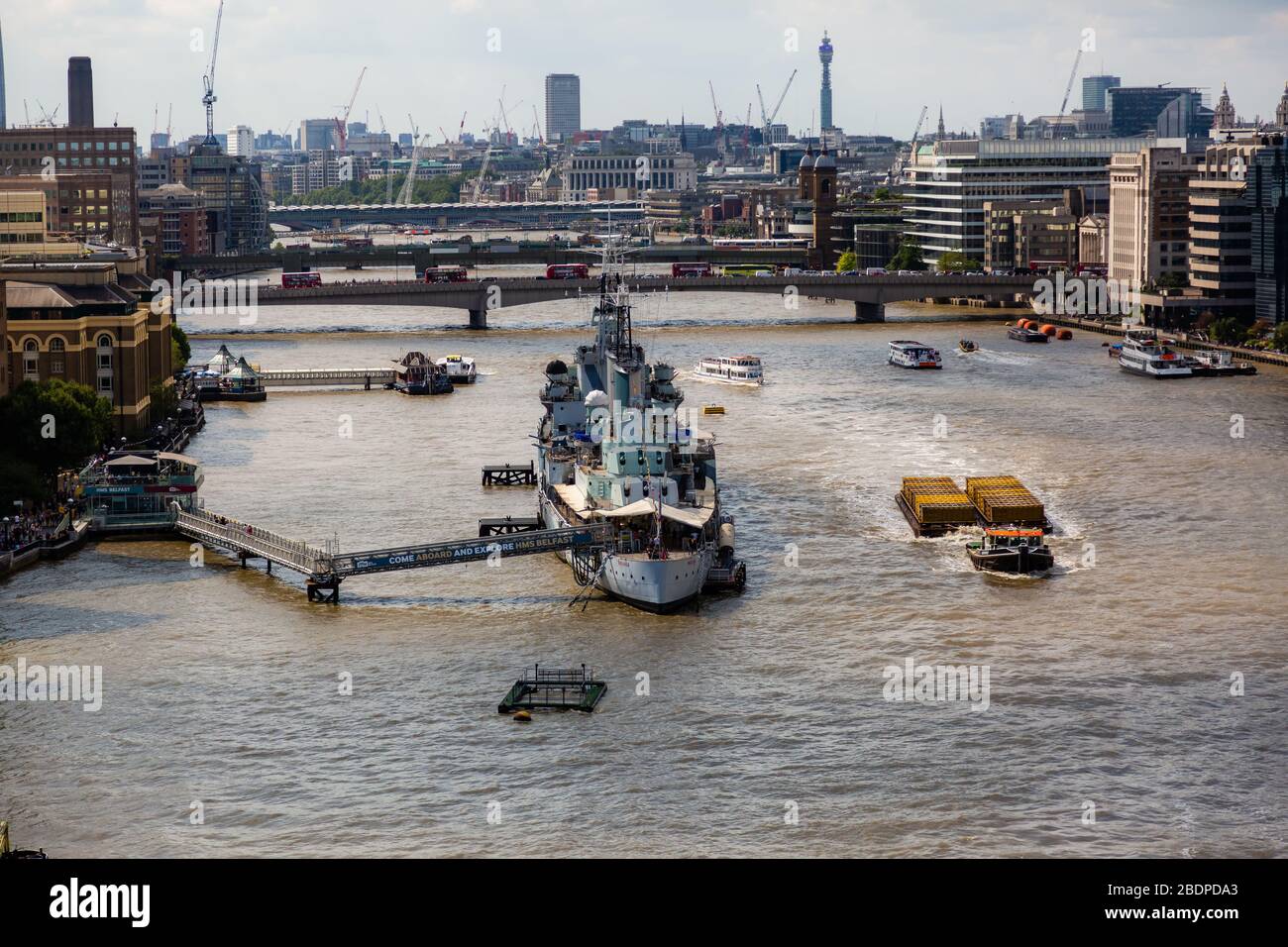 The Town-class light cruiser H.M.S. Belfast that is moored on the Thames River and serves as a Museum Ship operated by the Imperial War Museum. Stock Photo