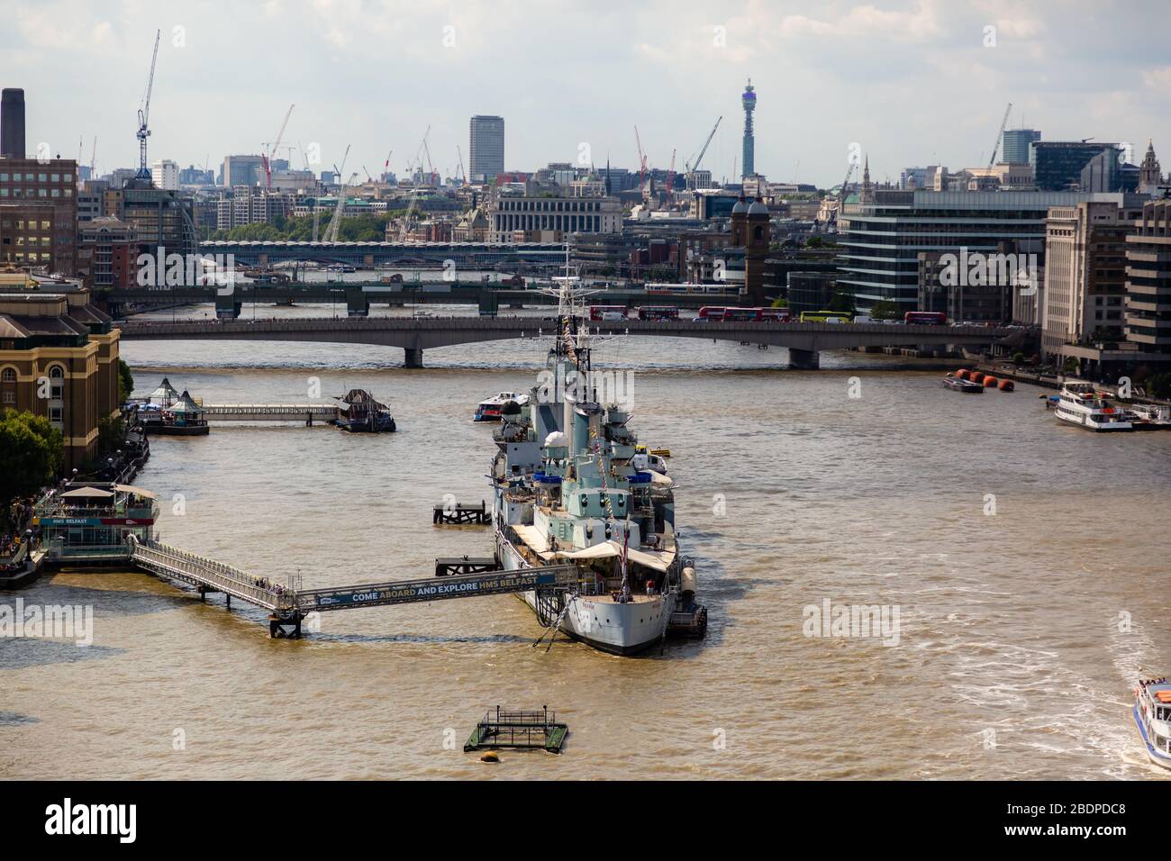 The Town-class light cruiser H.M.S. Belfast that is moored on the Thames River and serves as a Museum Ship operated by the Imperial War Museum. Stock Photo