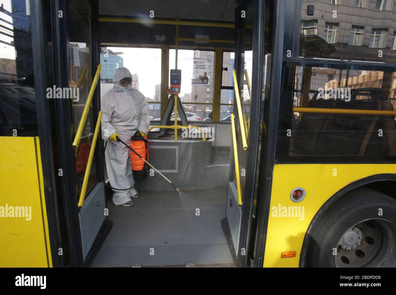 Kiev, Ukraine. 8th Apr, 2020. A staff member disinfects a bus in Kiev, Ukraine, April 8, 2020. The death toll from COVID-19 in Ukraine rose to 57 on Thursday, as the total cases reached 1,892, the country's health ministry said. On March 25, Ukraine introduced emergency measures across the country through April 24 to contain the spread of the disease. Credit: Sergey Starostenko/Xinhua/Alamy Live News Stock Photo