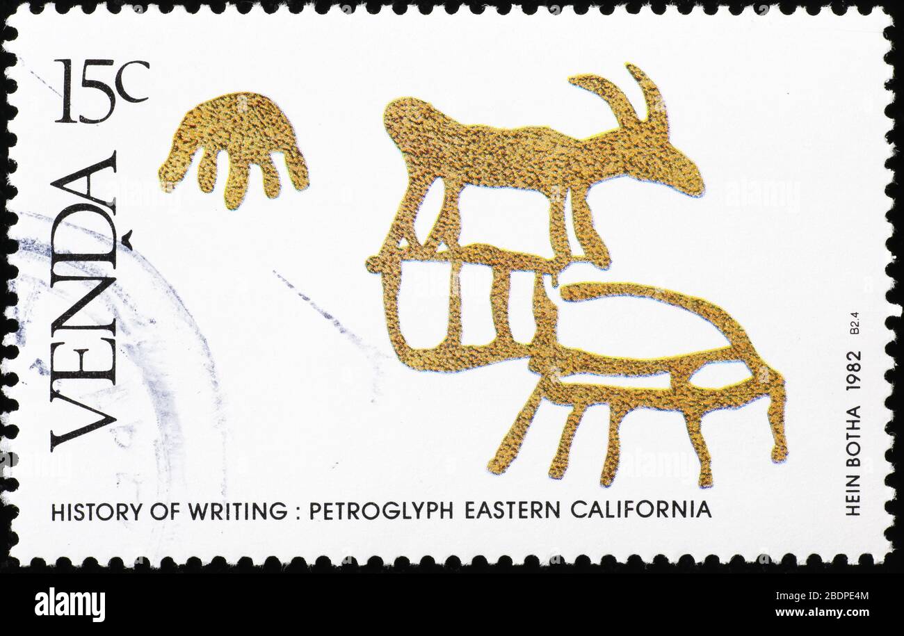 Prehistoric petroglyphs of eastern California on postage stamp Stock Photo