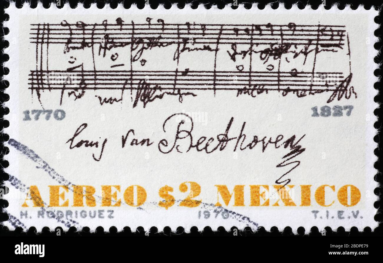 Sheet music signed by Beethoven on postage stamp Stock Photo