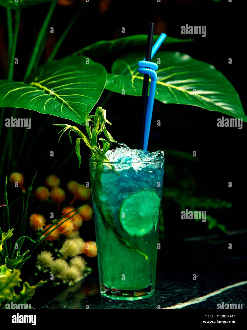 blue cocktail with lots of crushed ice Stock Photo Alamy