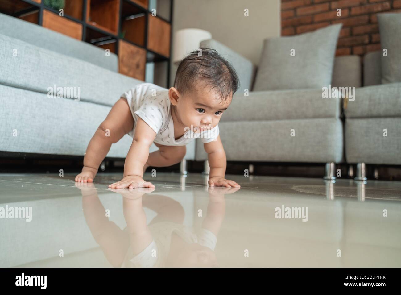 Asian baby crawl hi-res stock photography and images - Alamy