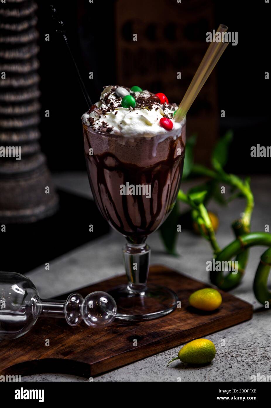 chocolate milkshake with whipped cream and candies on top Stock Photo Alamy
