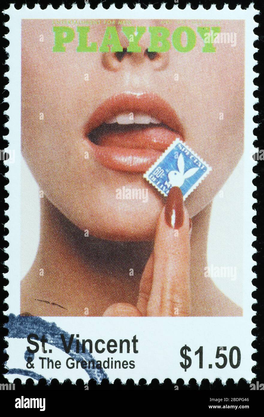 Old cover of Playboy magazine on postage stamp Stock Photo