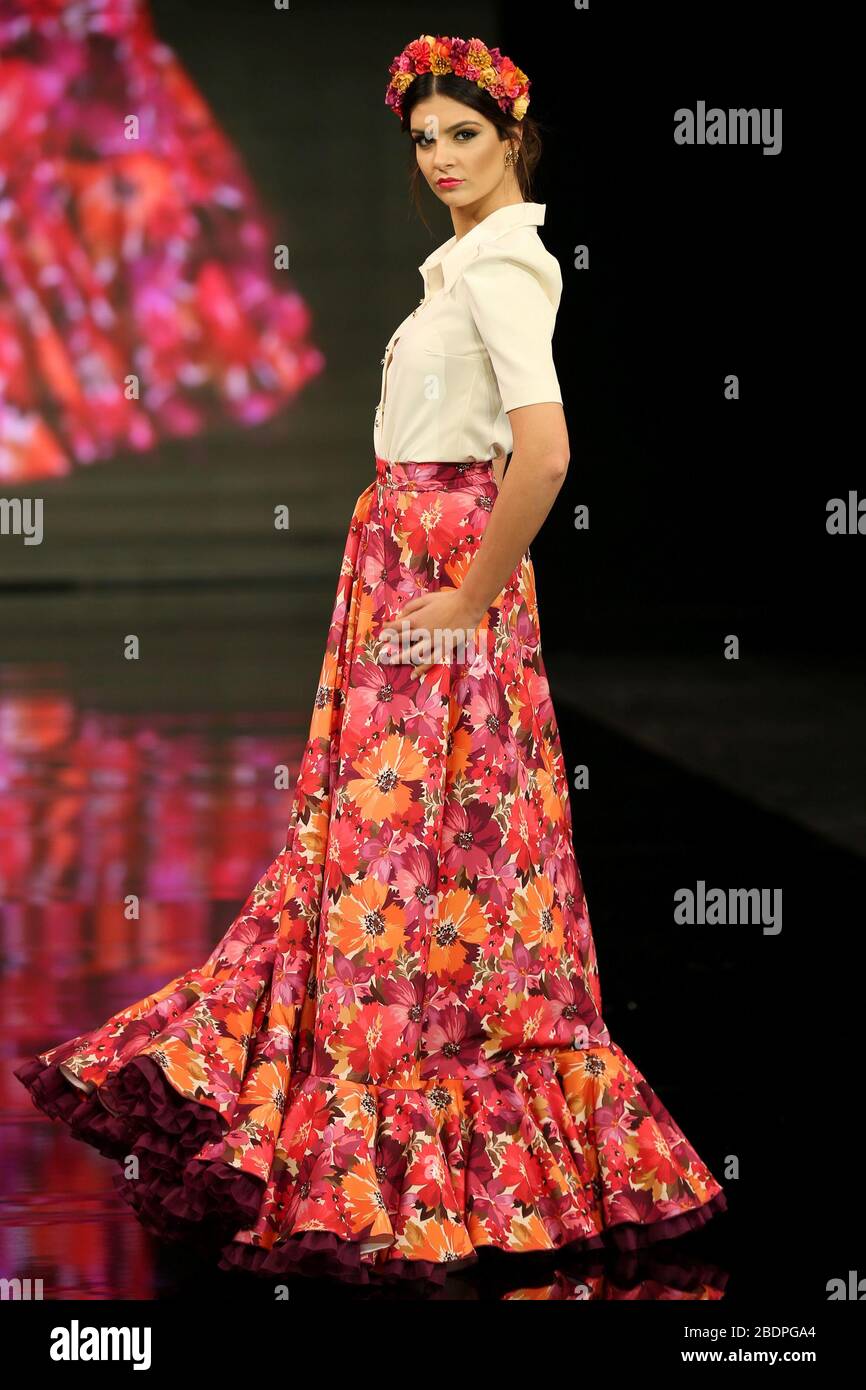 SEVILLA, SPAIN - JAN 30: Model Candela Garrido wearing a dress from the En Tierra Extrana collection by designer Maria Fernandez Fuentes as part of the SIMOF 2020 (Photo credit: Mickael Chavet) Stock Photo