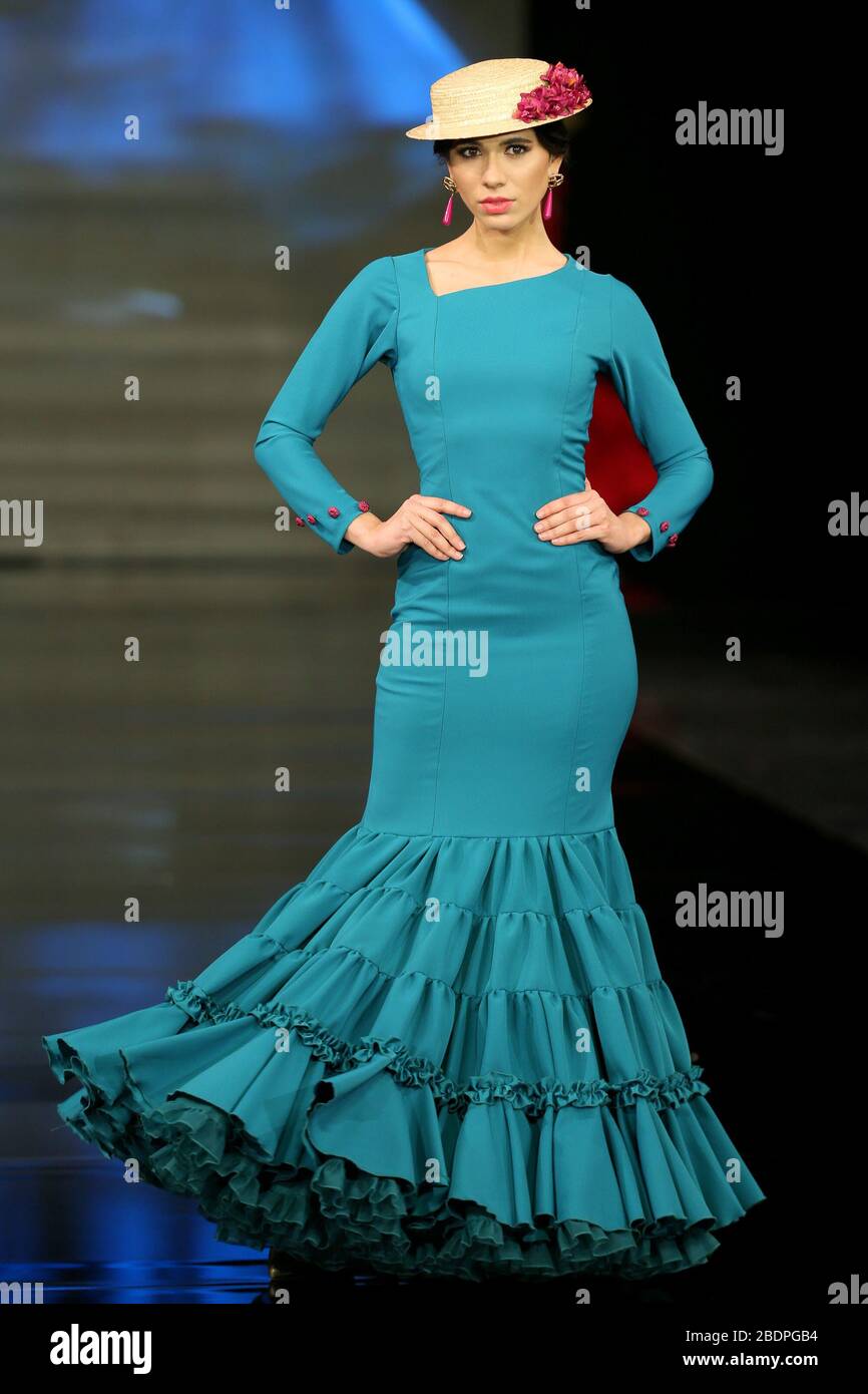 SEVILLA, SPAIN - JAN 30: Model wearing a dress from the En Tierra Extrana collection by designer Maria Fernandez Fuentes as part of the SIMOF 2020 (Photo credit: Mickael Chavet) Stock Photo