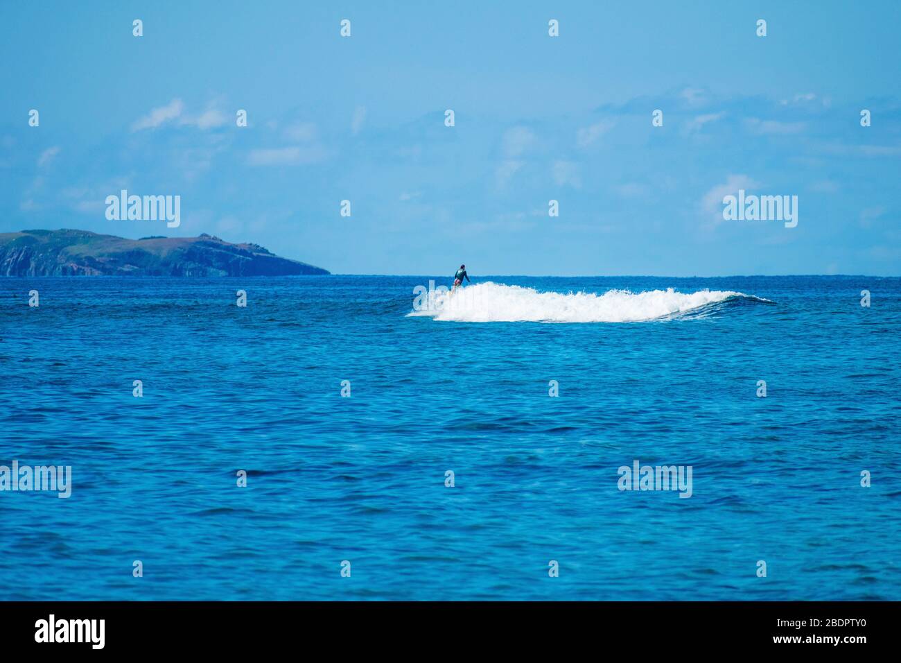 S Thomas United States Virgin Islands, Royalty free Ocean sports background, Caribbean beach vacation, Surfboarding, Surfer, Tranquil Ocean Landscape Stock Photo