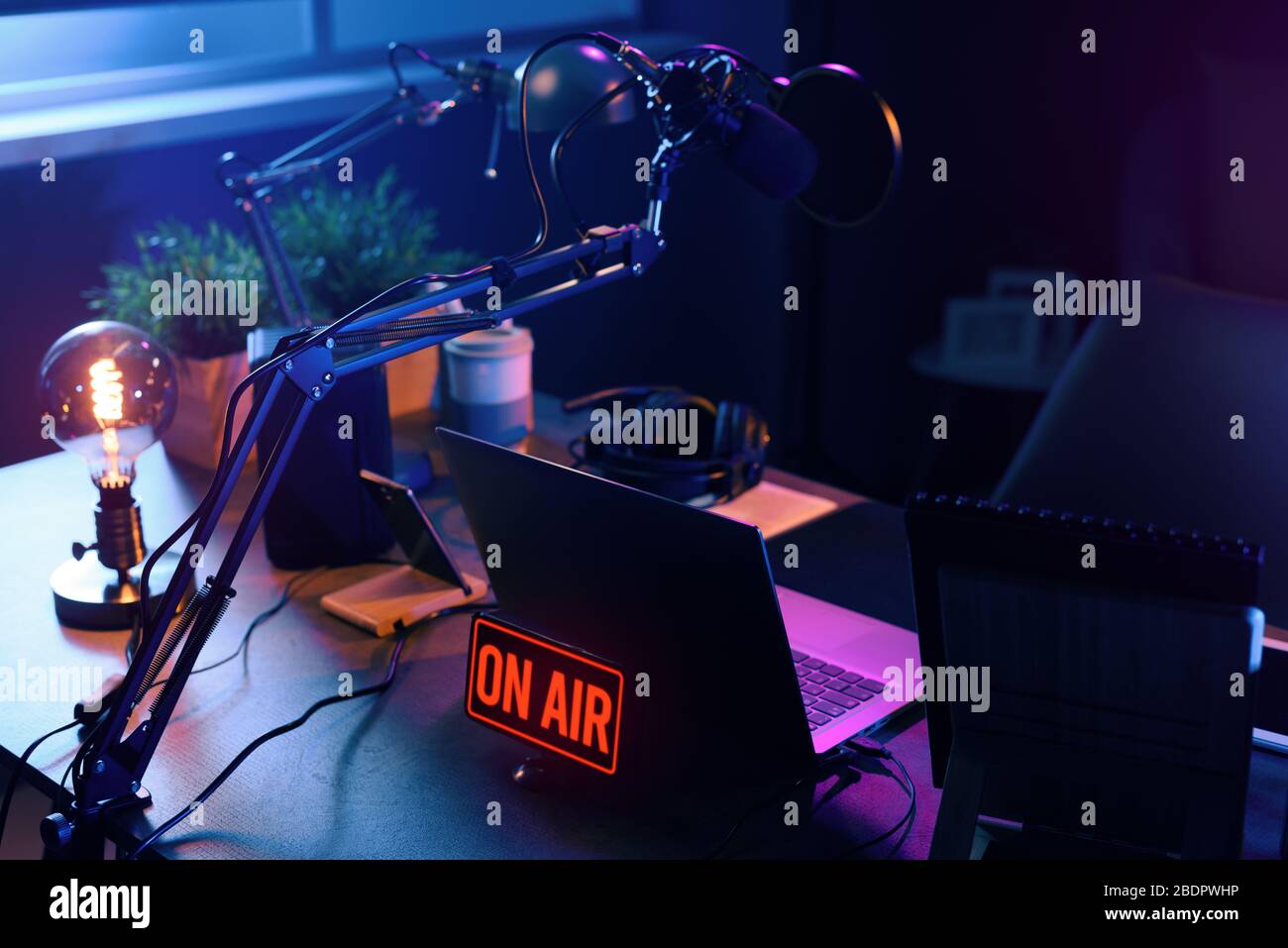 Live online radio broadcasting station desk with on air sign, entertainment and communication concept Stock Photo