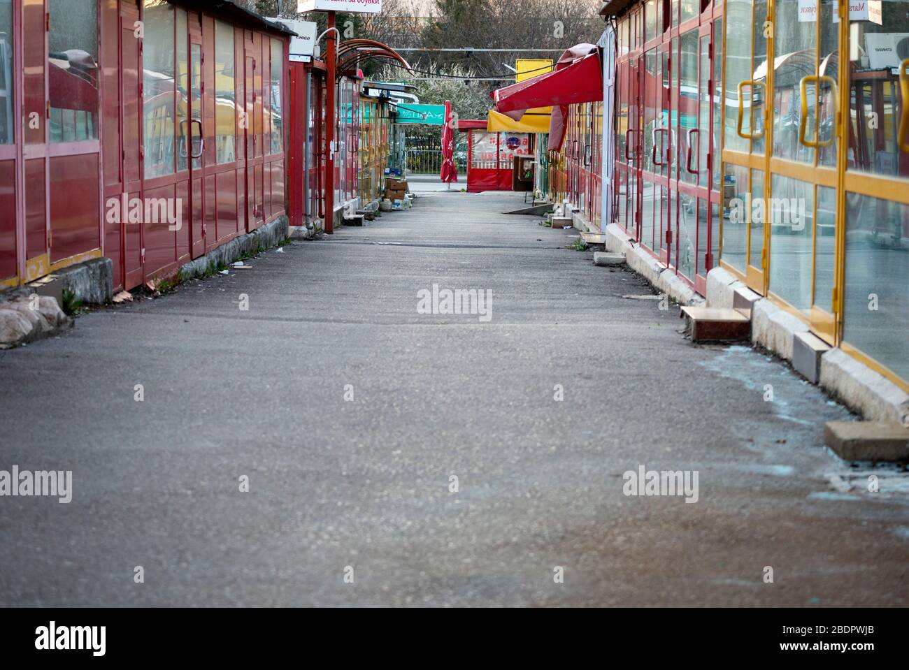 View of empty market lane and abandoned and deserted shops and small businesses closed down due to economic and industrial decline in the area in Sofia, Bulgaria, Eastern Europe as of 2020 Stock Photo