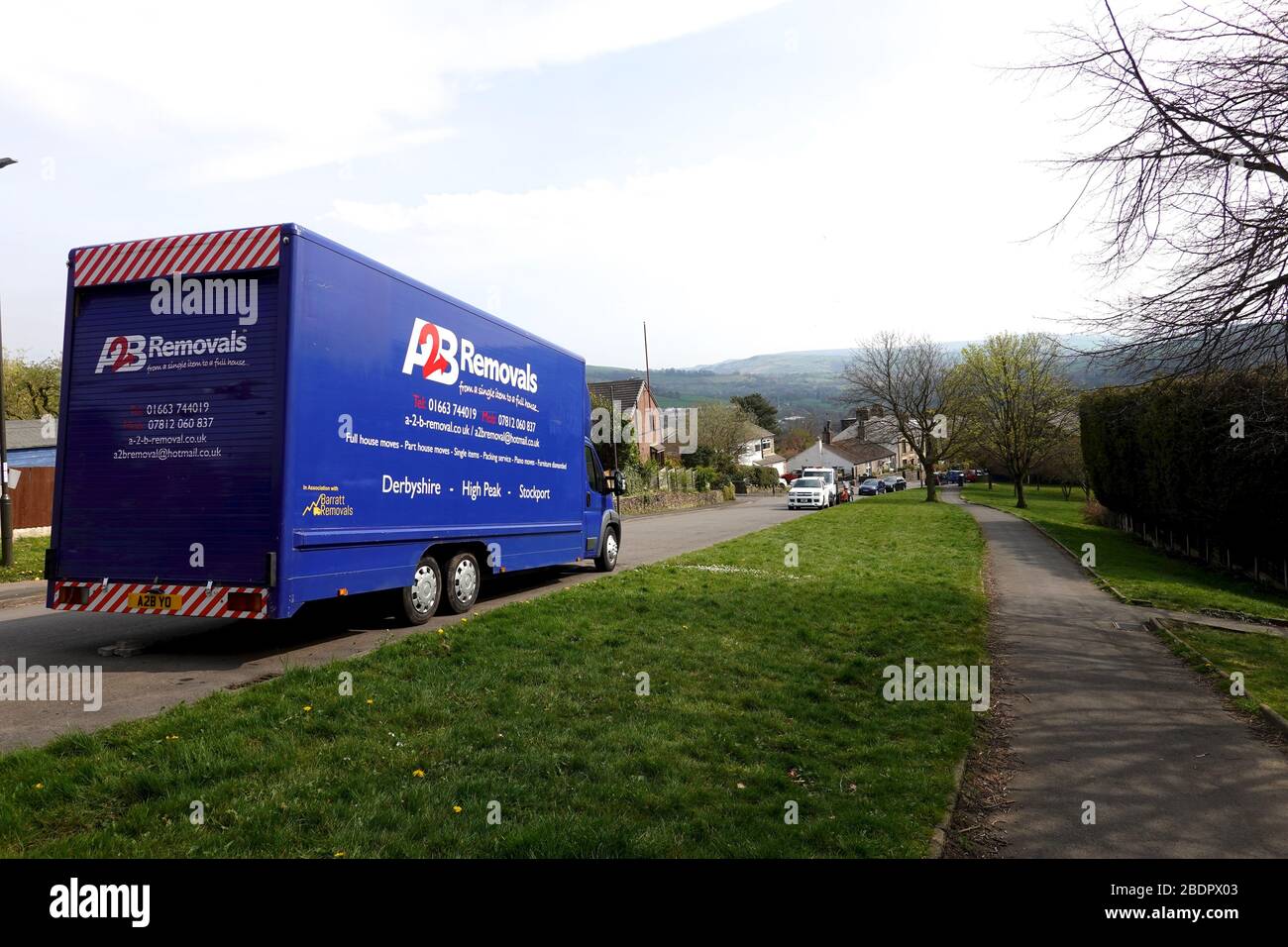 A removal van in New Mills, Derbyshire Stock Photo Alamy