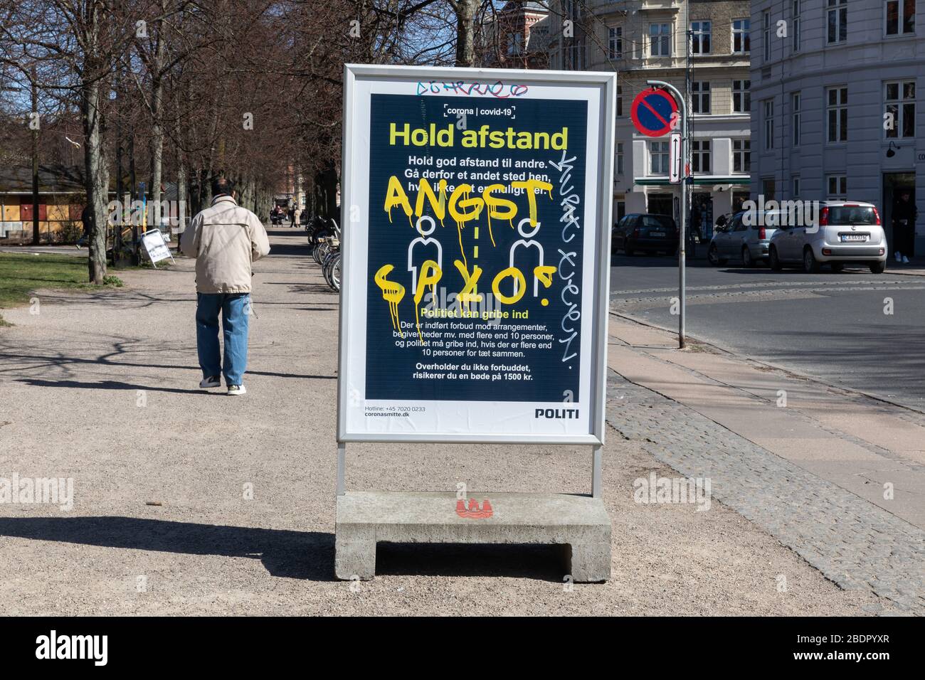 The word 'angst' sprayed on a Police notice board during the corona lockdown in Copenhagen. The tag is made by the anonymous activist called Spyo. Stock Photo