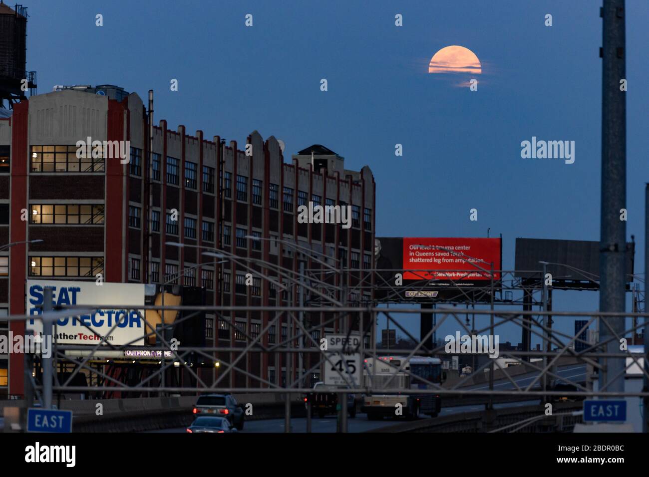 Super Pink Moon, New York, USA 07 Apr 2020 A Super Pink Moon rises