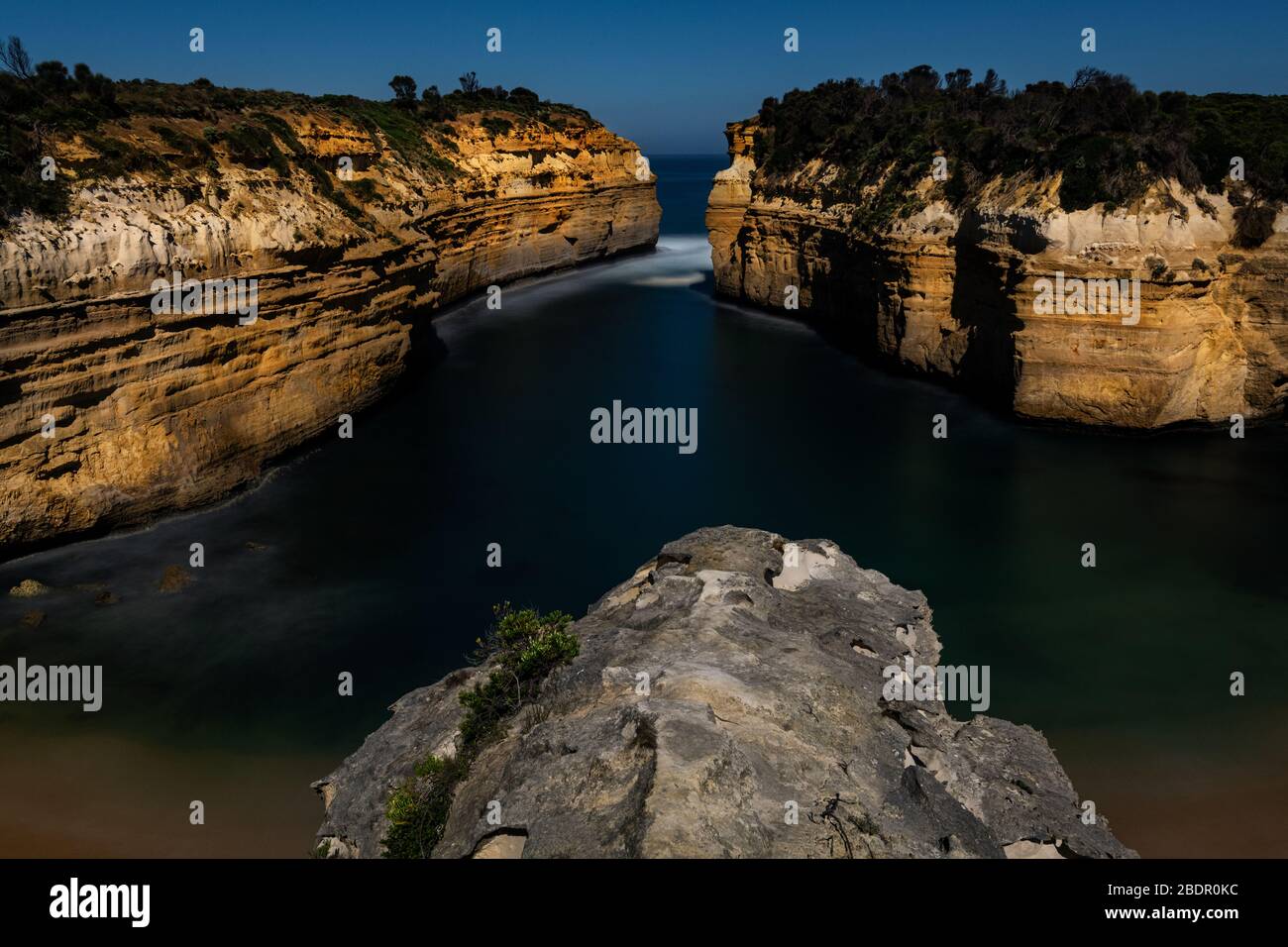 Nightly capture of Loch Ard Gorge under the light of full moon. Stock Photo