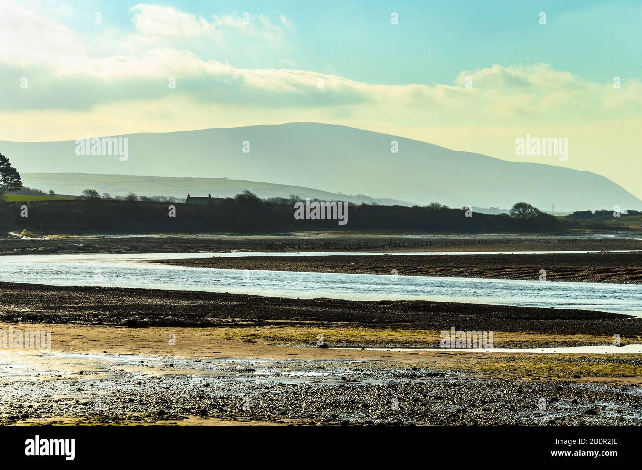 Estuary of the river Esk at Ravenglass in Cumbria England with Black Combe on the skyline Stock Photo