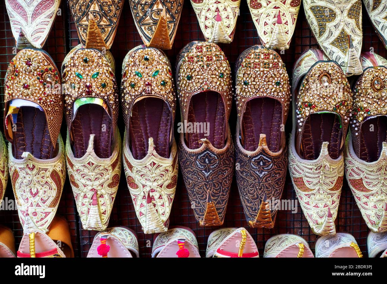 Arabian babouches shoes at market stall closeup Stock Photo