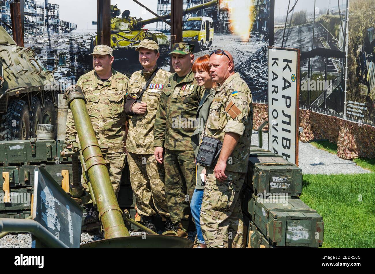 Dnipro, Ukraine - May 25, 2016: Combatant soldiers, volunteers and officers, Ukrainian veterans on the opening day of museum Russian-Ukrainian war in Stock Photo