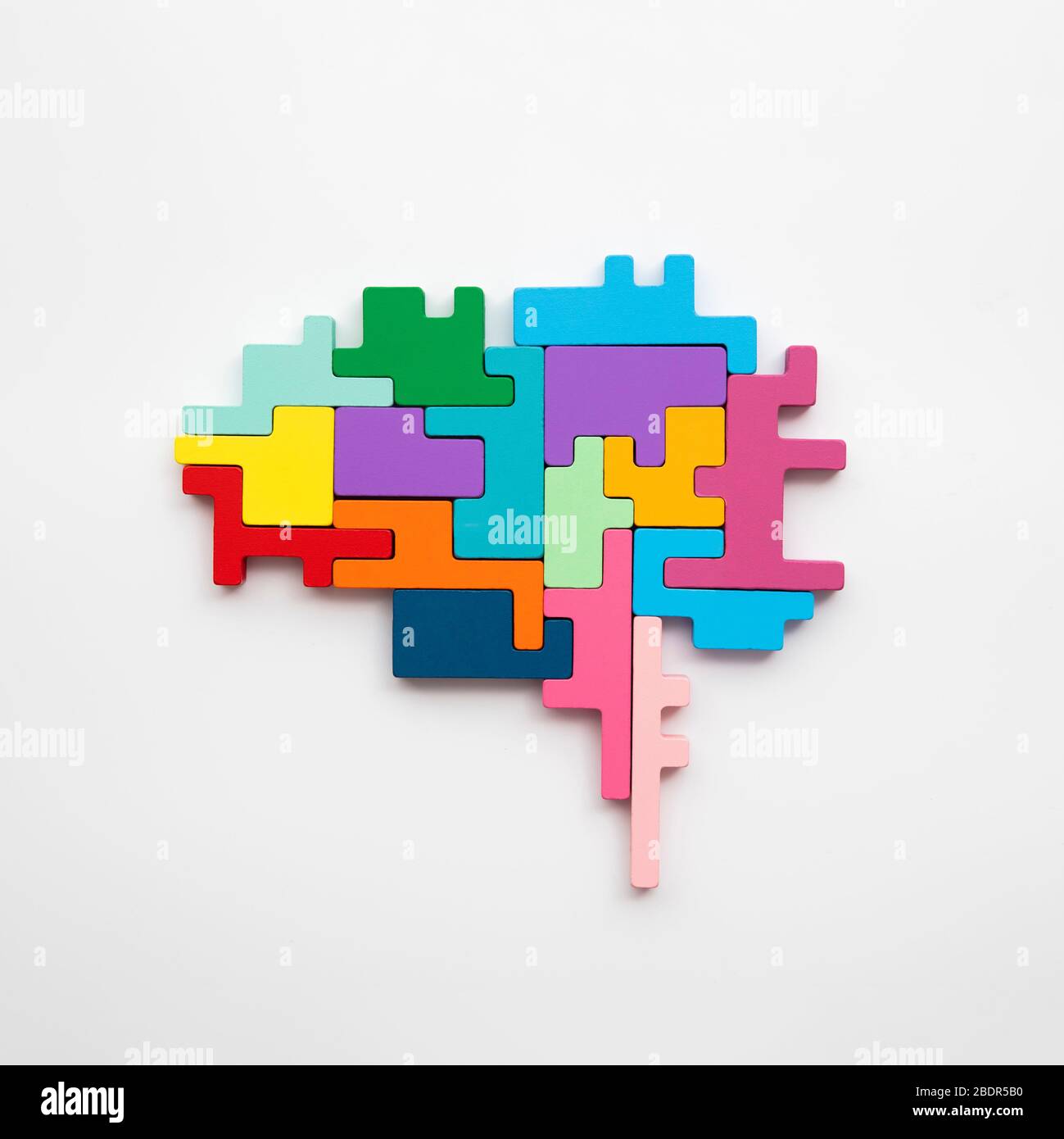 Brain shape made from wooden puzzle blocks. Locical thinking side of