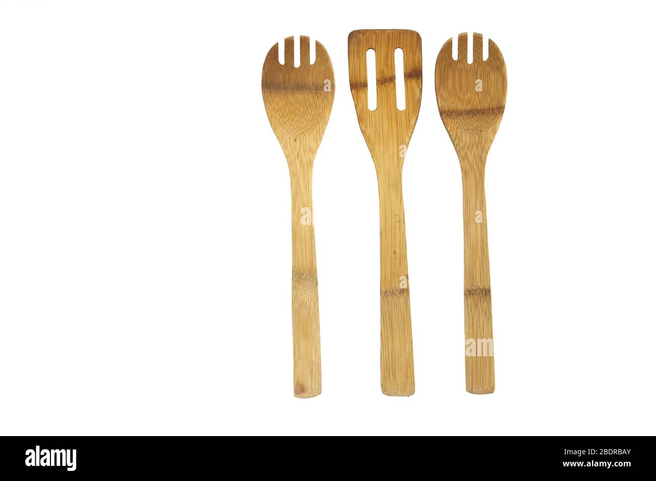 Three wooden utensils to work in the kitchen of our house. Stock Photo