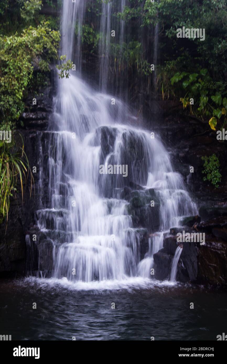 A small waterfall, falling into a secluded pool in the Troutbeck stream