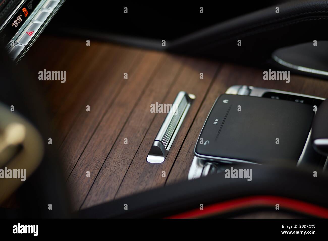 Touch control panel for multimedia system in a modern car. Stock Photo