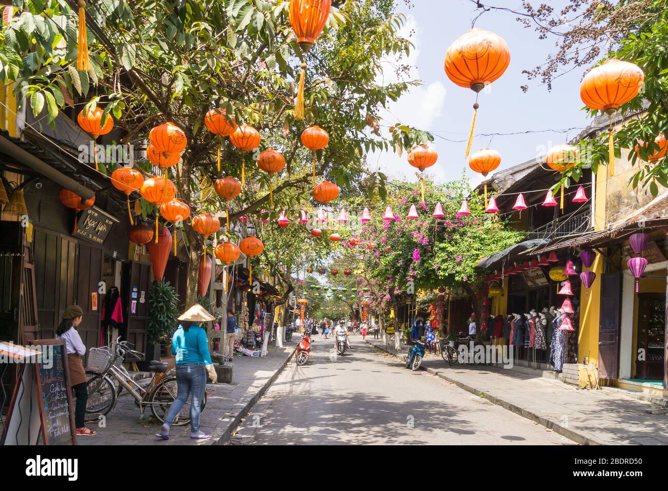 Vietnam Hoi An - Street with orange lanterns in Hoi An ancient town, Vietnam, Southeast Asia. Stock Photo
