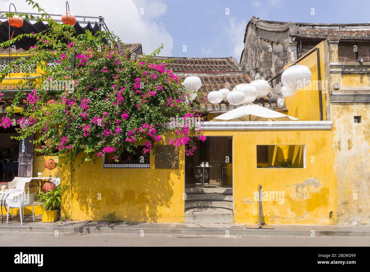 Vietnam Hoi An - One among a lot of yellow houses in Hoi An ancient town, Vietnam, Southeast Asia. Stock Photo