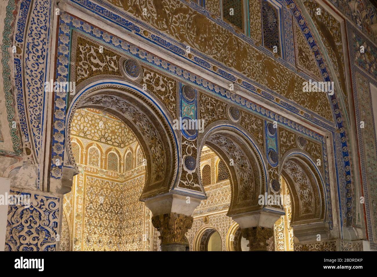 Royal Alcazars, Seville, Seville Province, Andalusia, Spain.   Decorated arches leading to the Salon de Ambajadores, the Salon of the Ambassadores.  T Stock Photo