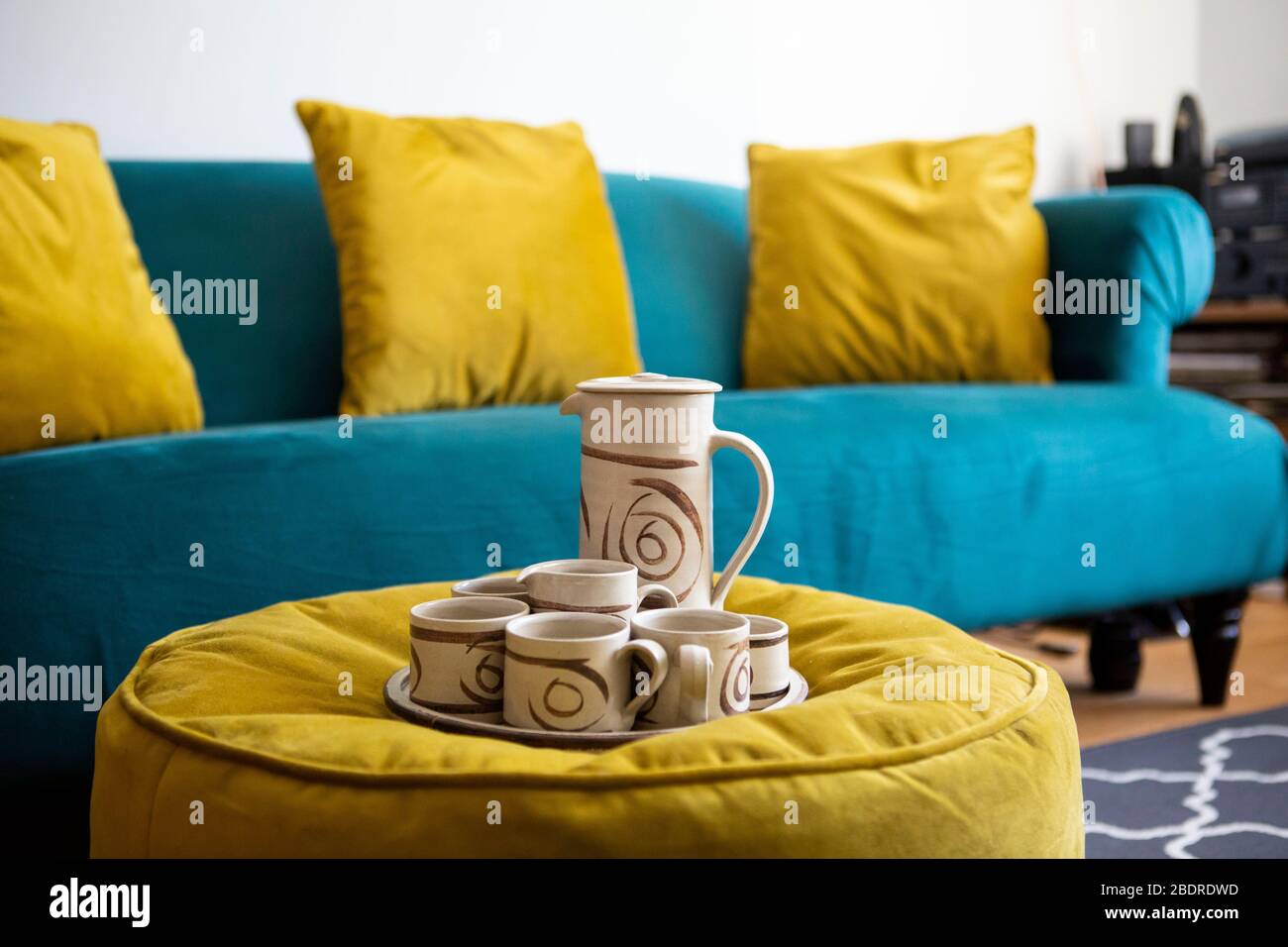 images Teal Velvet Couch Living Room https www alamy com coffee pot and cups with teal velvet sofa image352713689 html