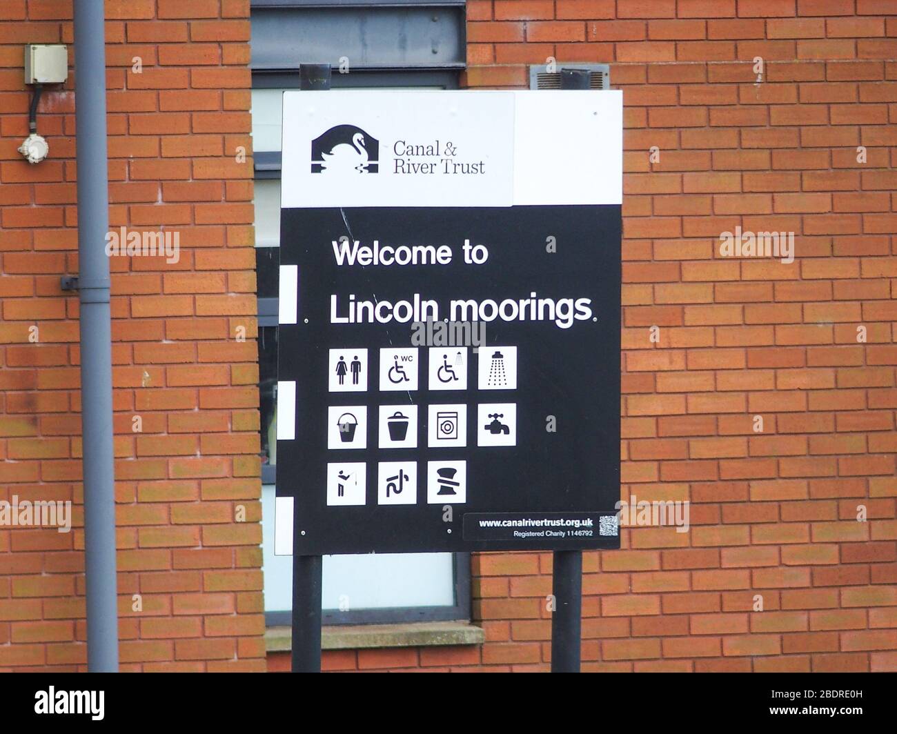 Canal and River Trust Sign, Lincoln Moorings, Foss Dyke Navigation, between Lincoln and Burton Waters Stock Photo