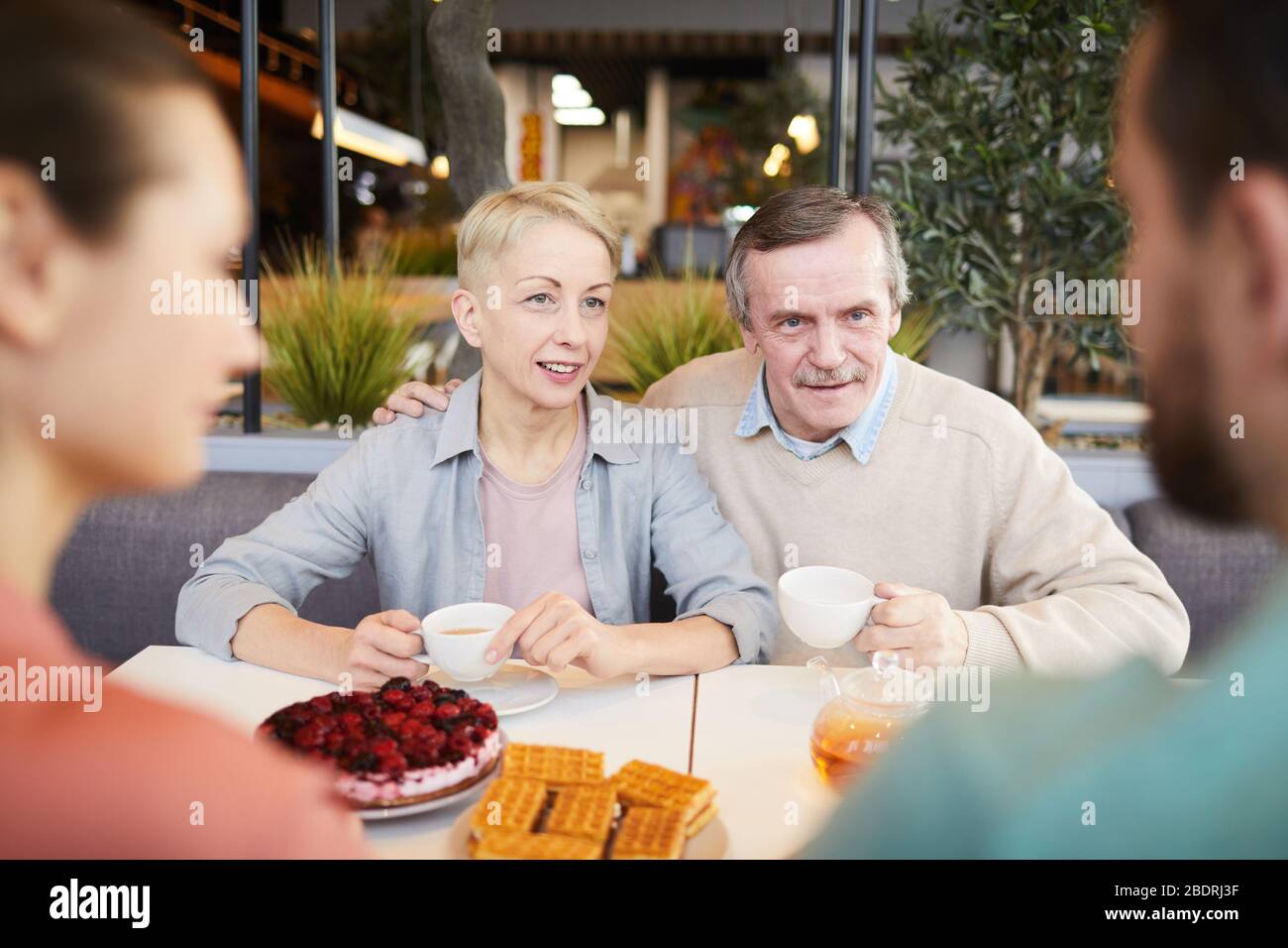 Indoors women mature table tea hires stock photography and images Alamy