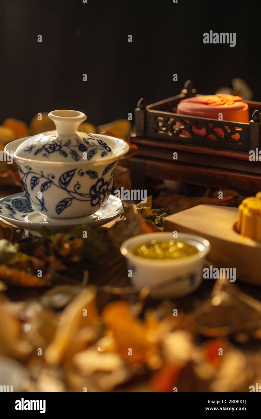 The moon cake with Chinese style tea cups Stock Photo