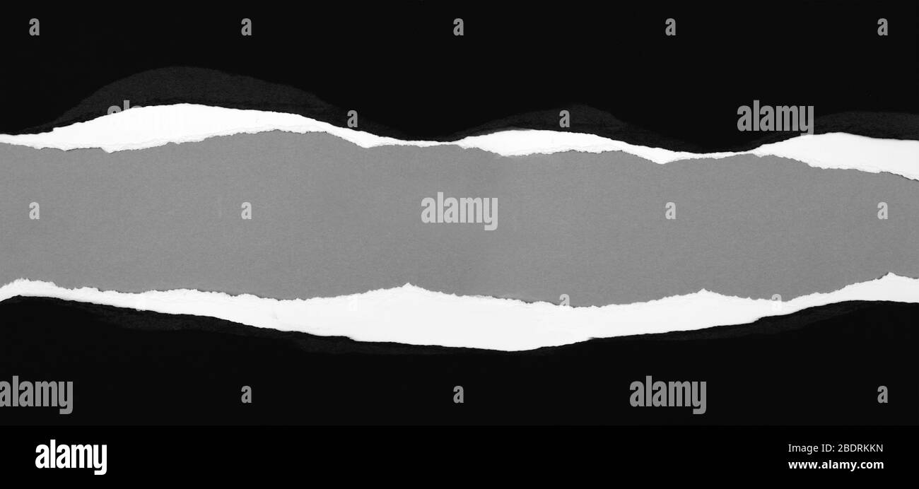 Ripped paper on grey background, space for copy Stock Photo - Alamy