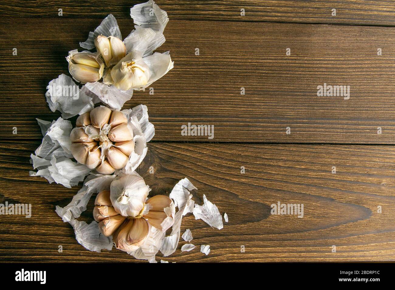 Garlic on vintage wood texture background. Top views with clear space ...