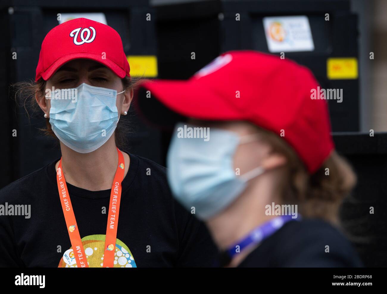 Washington, United States. 09th Apr, 2020. A volunteer with World Central Kitchen works at a food distribution site at Nationals Park in Washington, DC on Thursday, April 9, 2020. Jose Andres's World Central Kitchen is using Nationals Park to prepare and distribute food to agencies that help needed individuals during the Coronavirus pandemic. Photo by Kevin Dietsch/UPI Credit: UPI/Alamy Live News Stock Photo