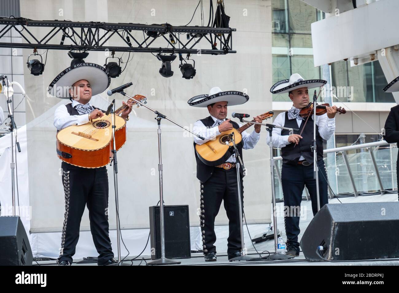Musicians performing in a Mexican mariachi Band at Yonge and Dundas