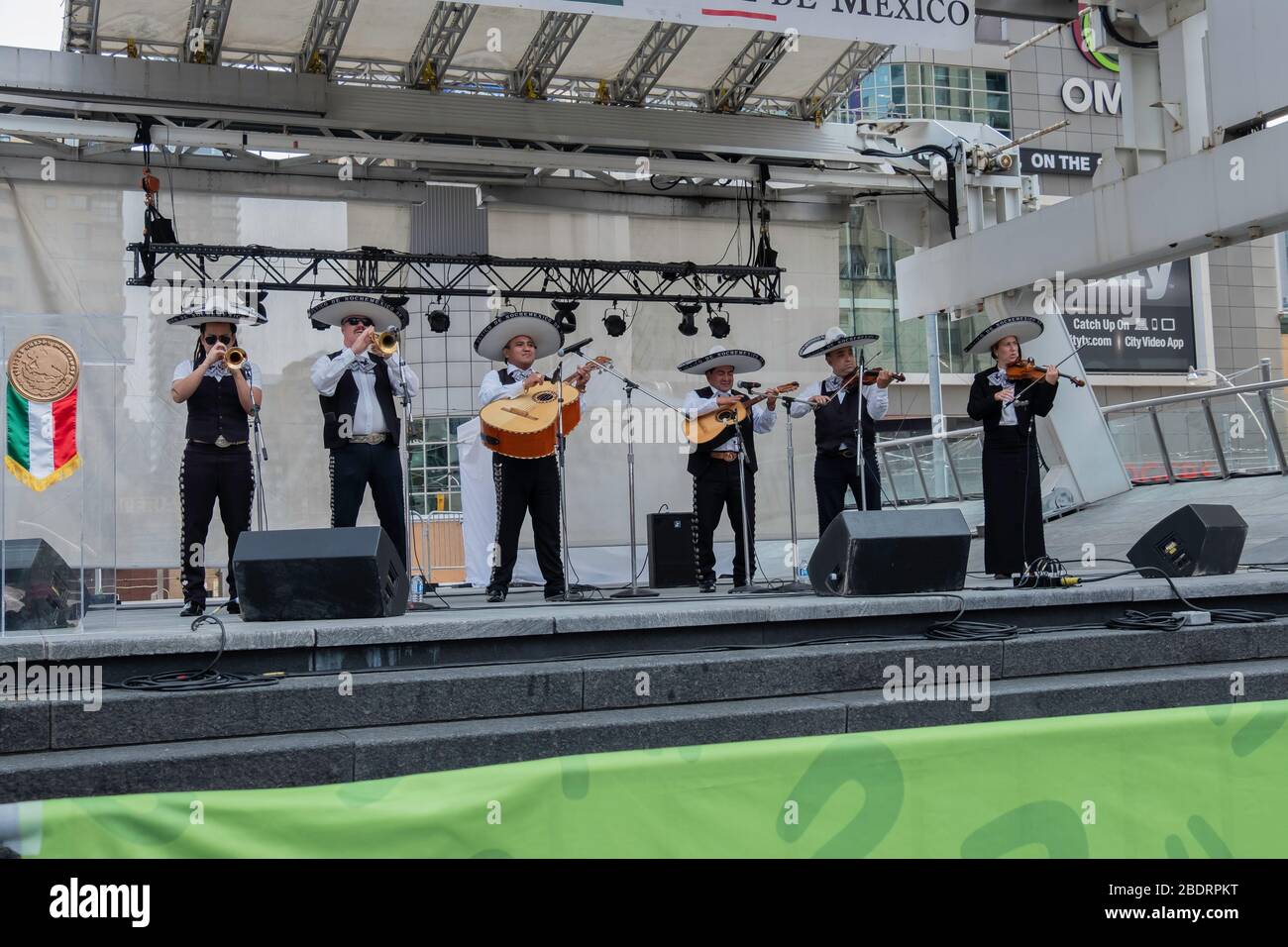 Musicians performing in a Mexican mariachi Band at Yonge and Dundas